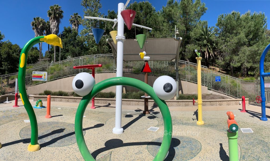 Crown Valley Park Splash Pad with spraying rings and dumping buckets in Laguna Niguel CA 
